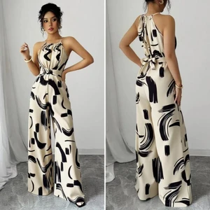 Macacão Feminino Longo Elegante Ombro Pernas Largas e Cintura com Laço Estampa Abstrata