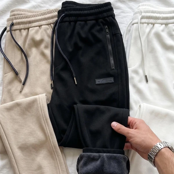 [Pague 2, Leve 3!] Calça Jogger Nordic Masculina em Algodão Texturizado, Poliéster e Forro Fleece de Alta Retenção Térmica com Ajuste Trançado e Ponteiras Metálicas