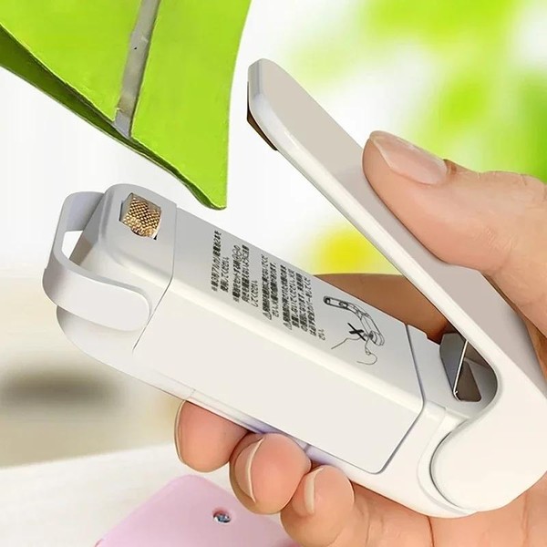 Mini saco de calor máquina selagem pacote aferidor sacos de plástico térmico saco de alimentos fechamento portátil aferidor embalagem de alimentos selador de calor