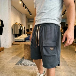 [Pague 3, Leve 5] Bermuda Draken Masculina em Malha Técnica Microperfurada, Ajuste de Tração e Bolsos Cargo Utilitários com Patch Tático Emborrachado